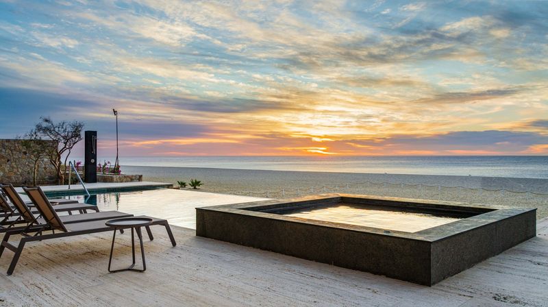 The beachfront pool at sunrise